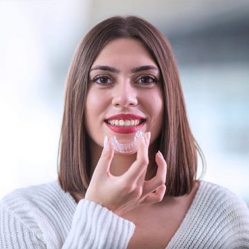 Say Goodbye to Crooked Teeth: Discover the Benefits of Invisalign from a Dentist Near You
